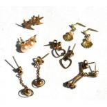 Six pairs of 9ct gold earrings including pearl studs.