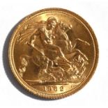 An Elizabeth II 1962 full gold sovereign.