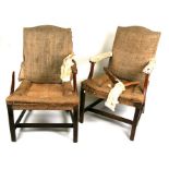 A pair of George III Gainsborough elbow chairs (2).
