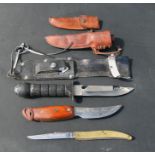 A group of sheath and packet knives