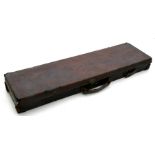 A leather gun case, 81cms (32ins) long.