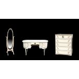 A white three-piece bedroom suite comprising a dressing table, 133cms (52ins) wide; a chest of