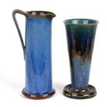 A Denby pottery Art Deco jug, 23cms (9ins) high; together with a similar trumpet vase, 21cms (8.