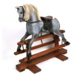 A Terry Cripps of Aylesbury hand crafted painted wooden rocking horse, overall 90cms (35.5ins)