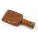 A 19th century brass mounted boxwood lead workers tool / sailor seam rubber, 19cms (7.5ins) high.