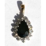 A 9ct gold sapphire set pendant.