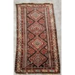 A late 19th century woollen hand knotted Shirvan rug of traditional palette and design, 153 by