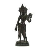 A bronze figure in the form of an Indian deity, 30cms (12ins) high.