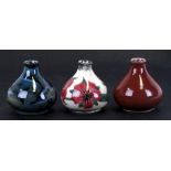 Three Cobrige stoneware vases in the manner of Moorcroft, all with impressed and painted marks to