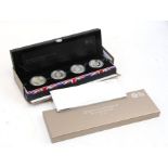 A Royal Mint Queen's Coronation 60th Anniversary £5 silver proof four coin set, boxed.