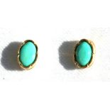 A pair of 9ct gold turquoise set stud earrings.Condition ReportGood condition with no damage or