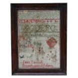 A 19th century needlework sampler by Janet Turnbull, Broom House, April 1865, with numbers, letters,