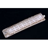 An early 20th century Chinese Canton ivory cribbage board, 18cms (7ins) long.