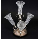 A silver plated epergne with four pressed glass flutes, 30cms (12ins) high.