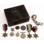 Three 1939-45 Star medals; a Defence medal, whistle and other items.