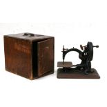 A Willcox sewing machine, cased.