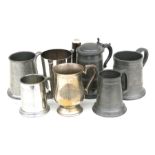 A quantity of pewter and silver plated tankards.