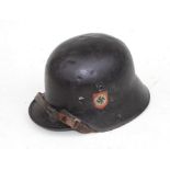 A WW2 Third Reich M16 double decal helmet with liner and chin strap.