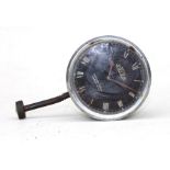 A pre WWII JAEGER 8-day dashboard clock, the black dial with Roman numerals, signed 'CHRONOS