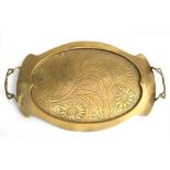 An Art Nouveau brass two-handled tray decorated with flowers, 47cms (18.5ins) wide.