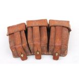 A brown leather Ammunition pouch with brass fittingsCondition ReportNo markings