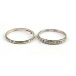 An 18ct white gold wedding band; together with a diamond set platinum half-eternity ring, approx