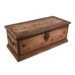 A small iron bound hardwood trunk, 63cms (24.75ins) wide.