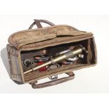 A tool kit suitable for an Austin 7 or similar Austin model,including open ended spanners, bottle