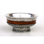 A late 19th / early 20th century Chinese Tibetan silver and burr wood mazer bowl with engraved