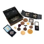 A group of coins, medals and medallions to include Royal Agricultural Society badge, English