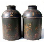 Two retail shop tin tea canisters and covers, number 1 & 2, decorated with figures and foliage on