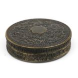 A Chinese horn snuff box of compressed circular form decorated with figures in a landscape, 9.