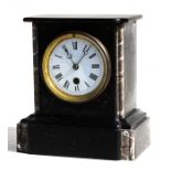 A Victorian black slate mantle clock, having a porcelain dial with Roman numerals, 19cms (7.5ins)