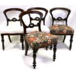 A set of four William IV mahogany dining chairs with upholstered seats and turned front legs (4).