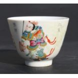 A Chinese famille rose cup decorated figures and calligraphy and having a red seal mark to the