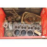 An Austin 7 cylinder barrel, SU carburettors, fuel pumps, and other items.