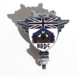 An original post-WWII British Racing Driver’s Club (BRDC) member’s badge, awarded to H R Attwood.
