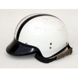 An Everoak crash helmet with peak.