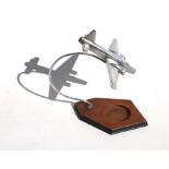 A desk stand, with applied chrome plated Lancaster bomber, overall height 22cm, 8½ inches