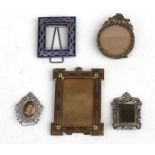 A group of portrait miniature picture frames.