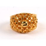 An Indian dress ring marked 22K, approx UK size 'P', 5.2g.