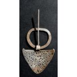 A white metal cloak pin possibly Middle Eastern