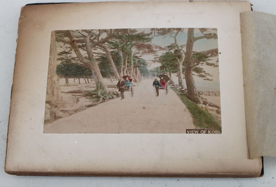 A late 19th century Japanese photograph album with fold-out pages containing twenty four colour - Image 4 of 4