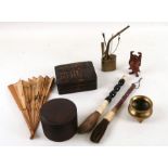 A group of Oriental items to include a Chinese censer, opium pipe, two calligraphy brushes, a carved