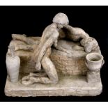 A reconstituted stone group depicting two lovers, 37cms (14.5ins) wide.