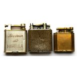 1930's Dunhill cigarette lighters, one engraved 'It's a Dream, it's Harella'.