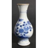 A Chinese blue & white baluster vase decorated flowers and butterflies, 20cms (8ins) high.