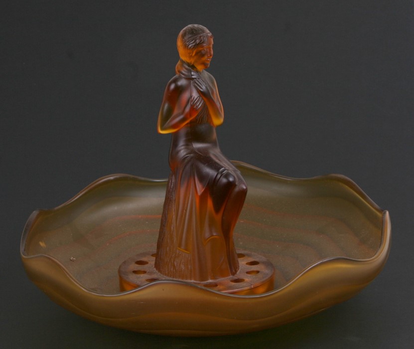 An Art Deco frosted amber glass table centrepiece with central maiden figure, 29cms (11.5ins)