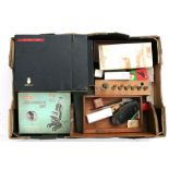 A Merrit microscope set, microscope slides and other scientific instruments.