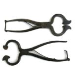 Two pairs of Georgian steel sugar cutters, 20cms (8ins) long (2).